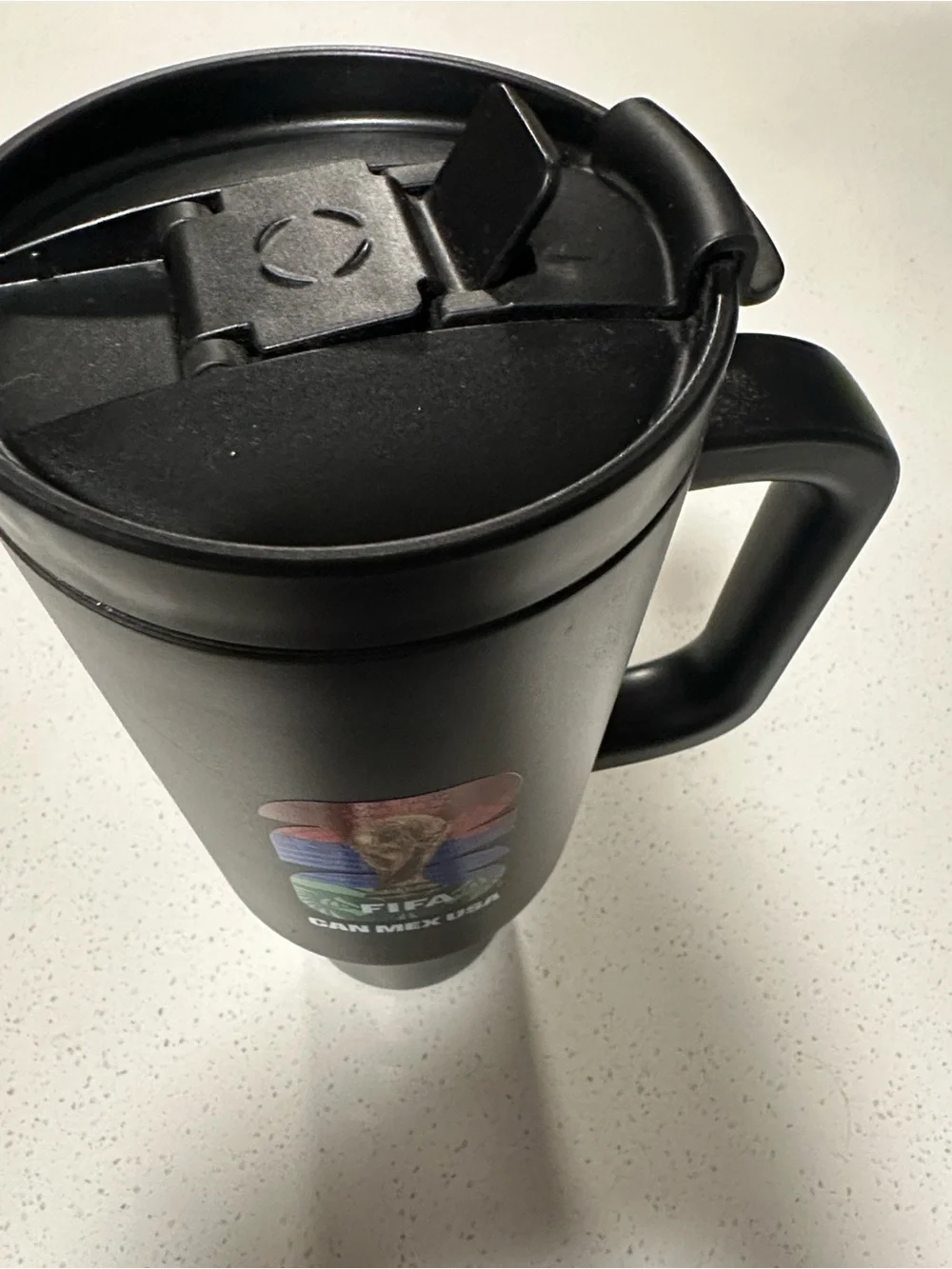 Official FIFA Black 40 oz. Travel Mug with Handle - CAN MEX USA World Cup Design